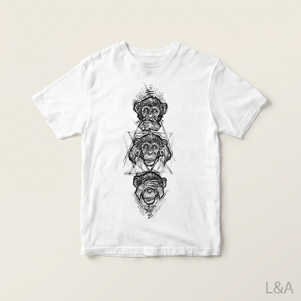 Three Wise Monkeys Graphic T-Shirt on plain background with L&A watermark
