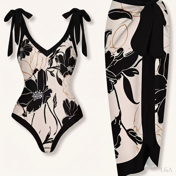 Elegant One-Piece Swimsuit with Wrap Skirt - flat lay on cream background