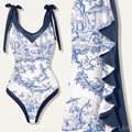 Printed Two-Piece Swimsuit with Cover-Up - flat lay on cream background