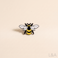 Bee Enamel Pin - cream background
